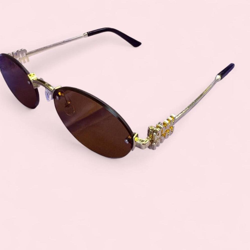 Brown oval sunglasses gold logo hardware brown lenses Rare luxurious mu mu